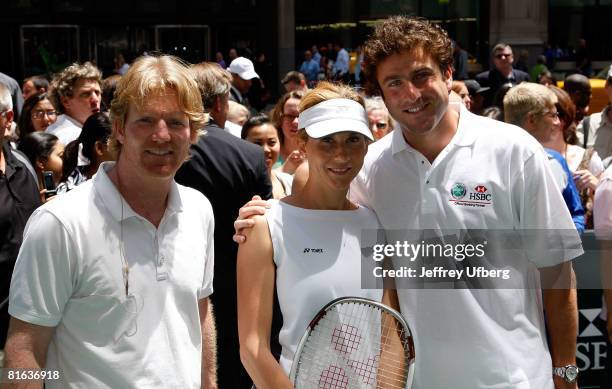 Tennnis Players Jim Courier, Monica Seles and Justin Gimelstob play on a pop-up tennis court on Fifth Avenue to celebrate the start of Wimbledon on...