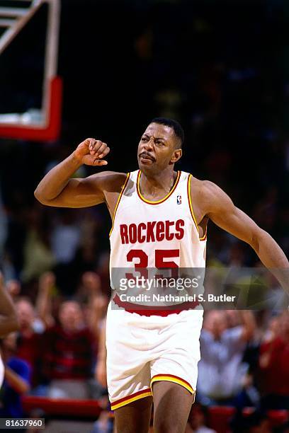 Earl Cureton of the Houston Rockets shows emotion in Game Seven of the Western Conference Semifinals against the Phoenix Suns during the 1994 NBA...