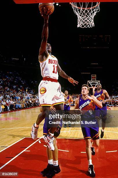 Vernon Maxwell of the Houston Rockets shoots a layup in Game Five of the Western Conference Semifinals against the Phoenix Suns during the 1994 NBA...
