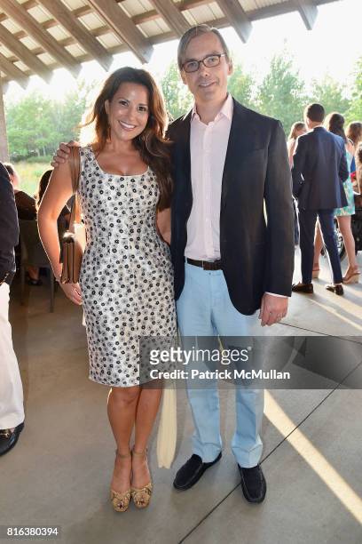 Gigi Stone Woods and Ian Woods attend the Midsummer Party 2017 at Parrish Art Museum on July 15, 2017 in Water Mill, New York.