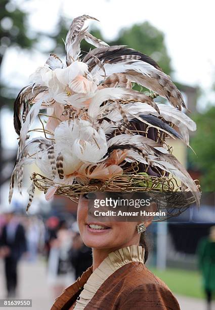 Lady wear a feathery hat during Ladies Day at Royal Ascot racecourse on June 19, 2008 in Ascot, England.