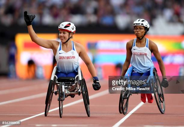 Hannah Cockroft of Great Britain celebrates victory in the Women's 800m T34 Final with with Kare Adenegan of Great Britain during day four of the IPC...