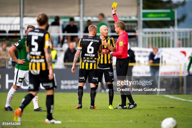Referee Glenn Nyberg shown a yellow card during the allsvenskan match between Jonkopings Sodra and BK Hacken at Stadsparksvallen on July 17, 2017 in...