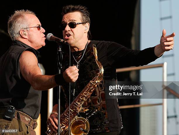 Trombone player Jimmy Pankow and sax player Walt Parazaider of the rock band Chicago perform on CBS' "The Early Show" at Charter One Pavilion on June...