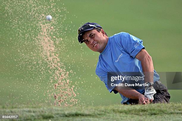 Scott Gardiner of Australia hits from the bunker on the 1st hole during the second round of the Knoxville Open at the Fox Den Country Club on June...