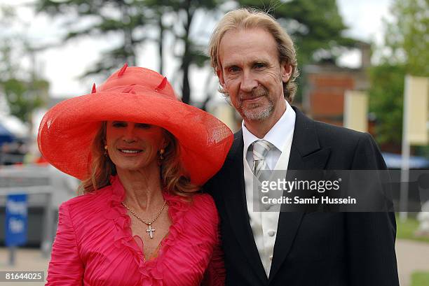 Mike Rutherford of Genesis arrives with wife Angie Rutherford on day 4 of Royal Ascot on June 20, 2008 in Ascot, England.