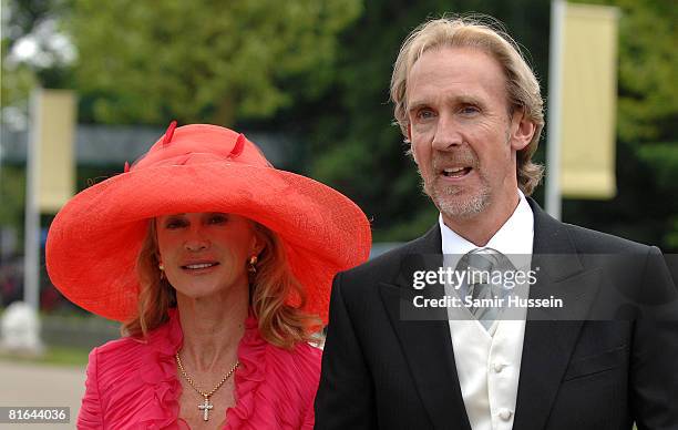 Mike Rutherford of Genesis arrives with wife Angie Rutherford on day 4 of Royal Ascot on June 20, 2008 in Ascot, England.