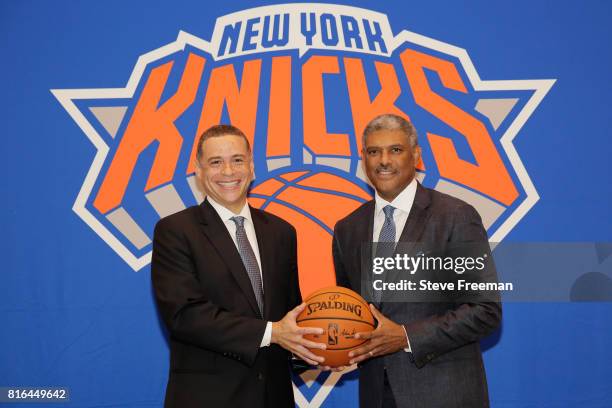 New York Knicks team President, Steve Mills and Jeff Hornacek of the New York Knicks introduce General Manager Scott Perry at a pess conference at...