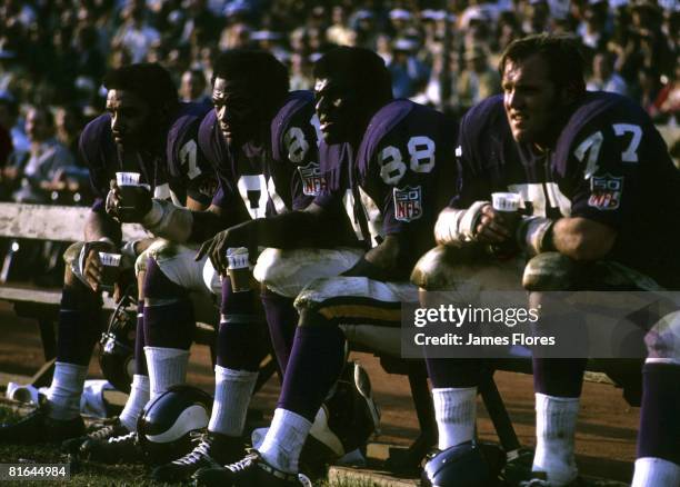 The Minnesota Vikings defensive front four of Jim Marshall , Hall of Fame defensive end Carl Eller , Hall of Fame defensive tackle Alan Page , and...