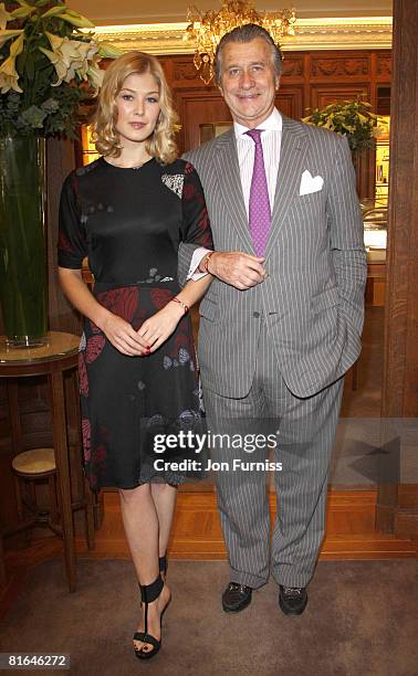 Rosamund Pike and Arnaud Bamberger launche the Cartier Love Charity Braclet in support of action against hunger at Catrier's Bond Street store on...