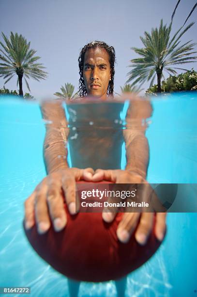 Wide Receiver T.J. Houshmandzadeh of the Cincinnati Bengals poses during a portrait session for the NFL Players Association at the Raleigh Hotel on...