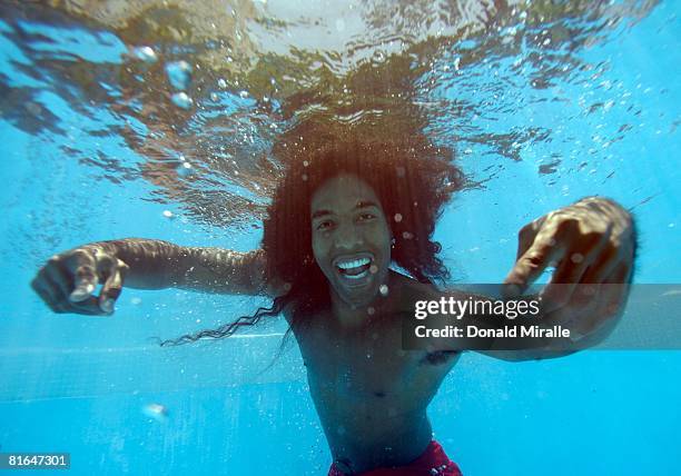 Wide Receiver T.J. Houshmandzadeh of the Cincinnati Bengals poses during a portrait session for the NFL Players Association at the Raleigh Hotel on...