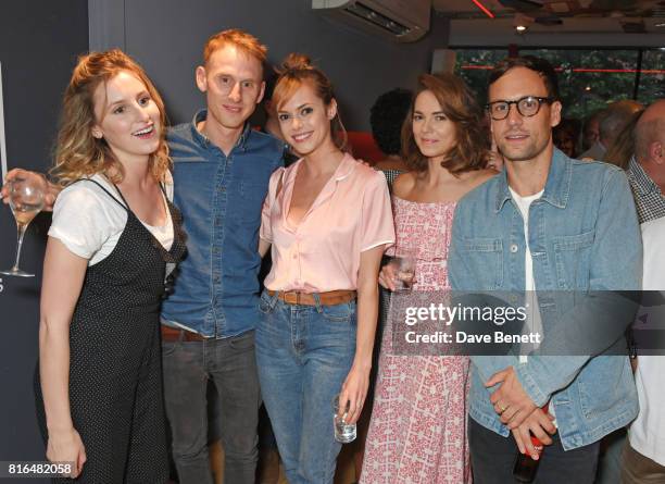 Laura Carmichael, Robert Emms, Hannah Tointon, Kara Tointon and Nick Blood attend the press night party for "Twilight Song" at The Park Theatre on...