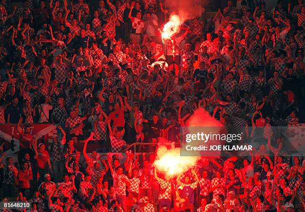Croatian fans hold flares during the Euro 2008 Championships quarter-final football match Croatia vs. Turkey on June 20, 2008 at Ernst Happel Stadium...