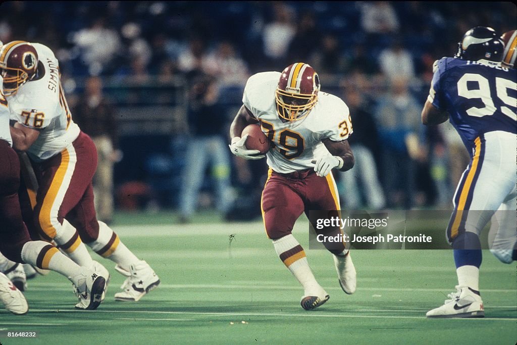 Ed Rubbert Running back Robet Green of the Washington Redskins runs upfield ...