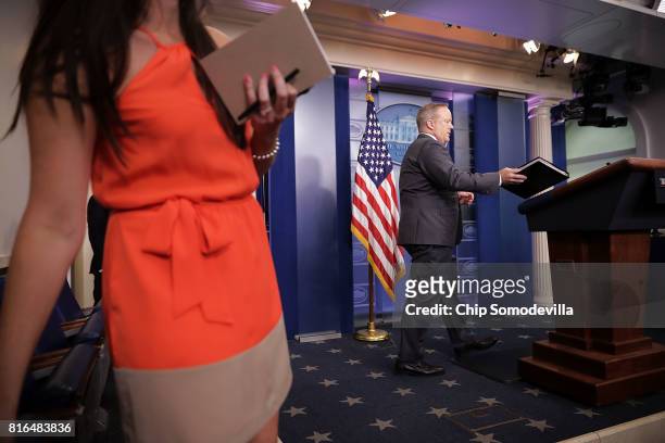 White House Press Secretary Sean Spicer arrives for an off-camera briefing in the Brady Press Briefing Room at the White House July 17, 2017 in...