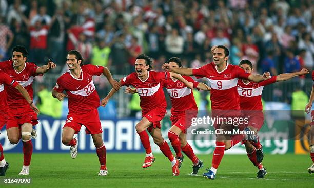 Turkey players celebrate after winning the penalty shoot out during the UEFA EURO 2008 Quarter Final match between Croatia and Turkey at Ernst Happel...