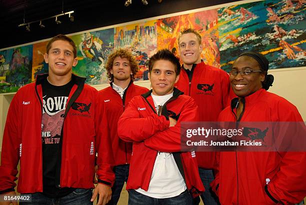 National Wrestling Team members Jake Deitchler, Ben Askren, Henry Cejudo, Adam Wheeler and Randi Miller pose during a clinic with student athletes in...