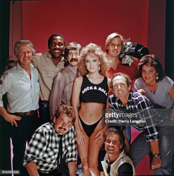 Actress Janis Farley, photographer Harry Langdon and Staff pose for a portrait in 1984 in Los Angeles, California.