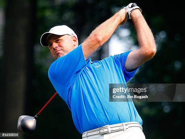 Stewart Cink watches his tee shot during the second round of the Travelers Championship at TPC River Highlands held on June 20, 2008 in Cromwell,...