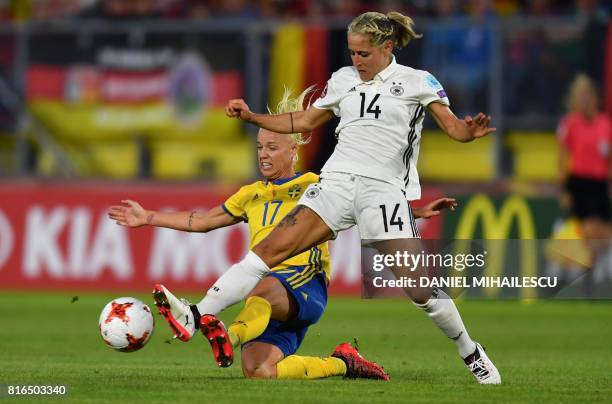 Anna Blasse of Germany vies with Caroline Seger of Sweden during the UEFA Womens Euro 2017 football tournament between Germany and Sweden at Rat...