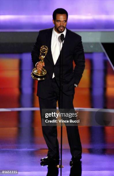 Actor Kristoff St. John accepts the Outstanding Supporting Actor In A Drama Series award for "The Young and the Restless" during the 35th Annual...
