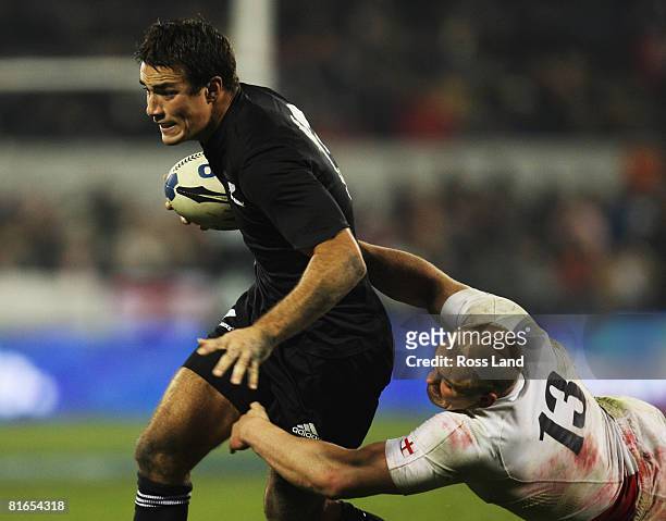 Richard Kahui of the All Blacks is tackled by Mike Tindall during the second Iveco Series test match between the New Zealand All Blacks and England...