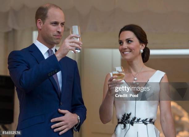 Prince William, Duke of Cambridge and Catherine, Duchess of Cambridge toast HM The Queen at the Queen's Birthday Garden Party at the Orangery,...