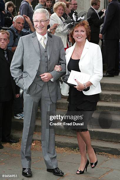 Paul O'Grady and Cilla Black attend Leah Wood and Jack Macdonald's wedding at Southwark Cathedral on June 21, 2008 in London, England.