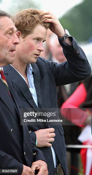 Prince Harry attends the Williams De Broe Polo test match at the Beaufort Polo Club on June 21, 2008 in Tetbury, England. He joined his brother...