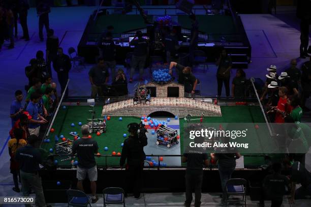 Participants compete during the first of two days of the First Global International Robot Olympics, an international robotic challenge, July 17, 2017...