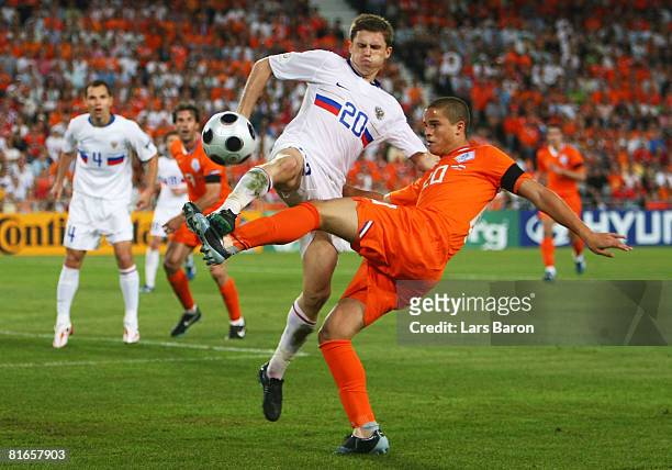 Igor Semshov of Russia challenges Ibrahim Afellay of Netherlands during the UEFA EURO 2008 Quarter Final match between Netherlands and Russia at St....