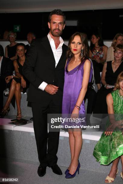 Rupert Everett and Allegra Versace attend Versace fashion show as part of Milan Fashion Week Spring/Summer 2009 on June 21, 2008 in Milan, Italy.