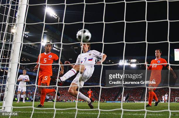 Dmitri Torbinskiy of Russia gets a foot to the ball and scores his teams second goal of the game during the UEFA EURO 2008 Quarter Final match...