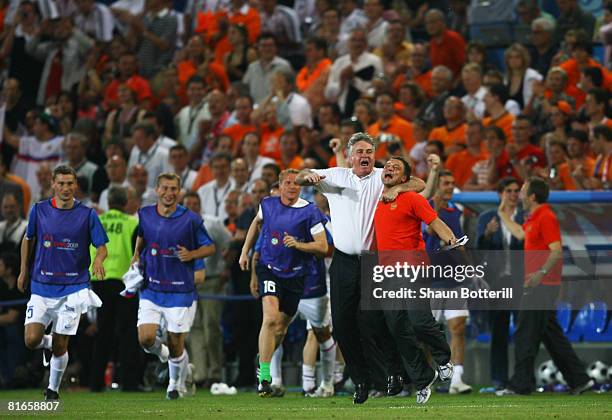 Guus Hiddink , head coach of Russia celebrates after winning the UEFA EURO 2008 Quarter Final match between Netherlands and Russia at St. Jakob-Park...