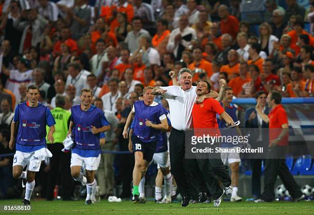 Guus Hiddink , head coach of Russia celebrates after winning the UEFA EURO 2008 Quarter Final match between Netherlands and Russia at St. Jakob-Park...