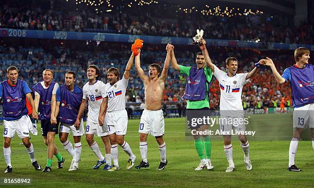 Russia players celebrate victory after the UEFA EURO 2008 Quarter Final match between Netherlands and Russia at St. Jakob-Park on June 21, 2008 in...