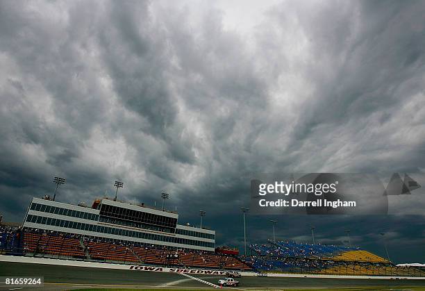 Storm clouds gather over the speedway during practice for the IRL Indycar Series Iowa Corn Indy 250 on June 21, 2008 at the Iowa Speedway in Newton,...