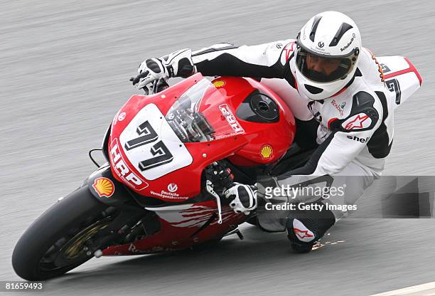Michael Schumacher of Germany competes during the training session of the international German motorbike championships at the 'Sachsenring' on June...