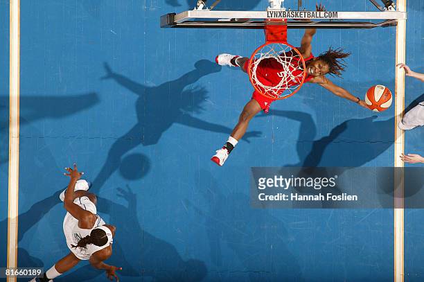 Erica White of the Phoenix Mercury rebounds against the Minnesota Lynx on June 21, 2008 at the Target Center in Minneapolis, Minnesota. NOTE TO USER:...