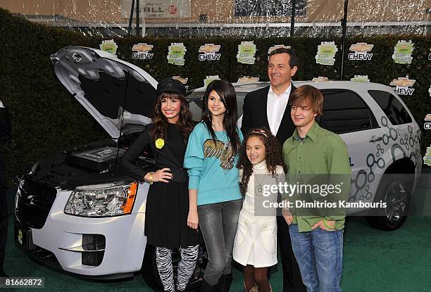 Actress Demi Lovato, actress Selena Gomez, actress Madison Pettis, President and CEO of the Walt Disney Corporation Robert Iger and actor Jason...