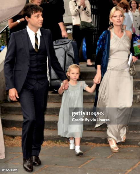 Jamie Hince, Kate Moss and her daughter attend Leah Wood and Jack Macdonald's wedding at Southwark Cathedral on June 21, 2008 in London, England.
