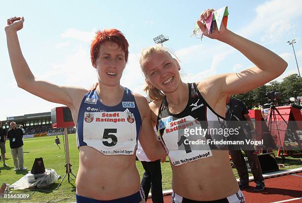 Lilli Schwarzkopf and Sonja Kesselschlaeger of Germany celebrates after qualified for the Olympic Games Beijing 2008 during the Erdgas Track and...