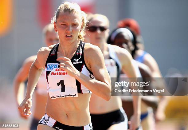 Lilli Schwarzkopf of Germany compete in the 800m event in the Heptathlon during the Erdgas Track and Field Meeting on June 22, 2008 in Ratingen,...