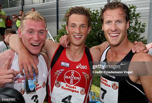Arthur Abele, Michael Schrader and Andre Niklaus of Germany celebrate after qualified for the Olympic Games Beijing 2008 during the Erdgas Track and...