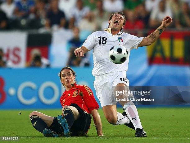 Antonio Cassano of Italy is tackled by Fernando Torres of Spain during the UEFA EURO 2008 Quarter Final match between Spain and Italy at Ernst Happel...