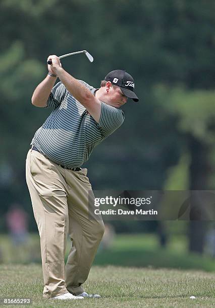 Jarrod Lyle of Australia hits his approach shot to the 10th green during the final round of the Knoxville Open at the Fox Den Country Club on June...