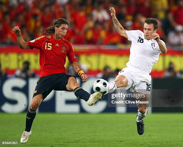 Sergio Ramos of Spain is challenged by Antonio Cassano of Italy during the UEFA EURO 2008 Quarter Final match between Spain and Italy at Ernst Happel...