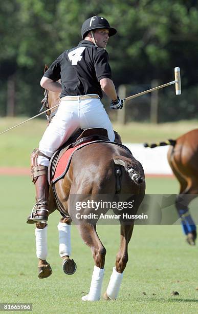 Prince William takes part in a charity polo match at the the Beaufort Polo Cub on June 22, 2008 in Tetbury, England.