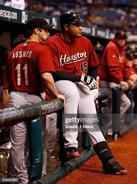 Designated hitter Carlos Lee talks with catcher Brad Ausmus of the Houston Astros during the game against the Tampa Bay Rays on June 22, 2008 at...